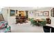Entertaining area with built-in bar, dining set, and bright lighting fixtures at 5236 Daniel Dr, Indianapolis, IN 46226