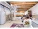 Spacious unfinished basement with carpet and mechanicals, offering customizable living space at 5335 Rum Cherry Way, Indianapolis, IN 46237