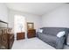 Bedroom featuring carpet, natural light, neutral walls and wood furnishings at 5335 Rum Cherry Way, Indianapolis, IN 46237