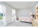 Bright bedroom featuring carpet, natural light, and neutral walls at 5335 Rum Cherry Way, Indianapolis, IN 46237
