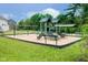 Community playground featuring swings, slides, and climbing structures, creating a fun and safe recreation area at 5335 Rum Cherry Way, Indianapolis, IN 46237