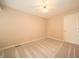 Bright, neutral bedroom with a ceiling fan and carpeted floors at 5352 Steinmeier N Dr, Indianapolis, IN 46220