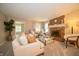 Comfortable living room featuring a brick fireplace and stylish furniture at 5352 Steinmeier N Dr, Indianapolis, IN 46220