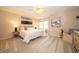 Inviting main bedroom with neutral tones, plush carpeting, and ample natural light at 5352 Steinmeier N Dr, Indianapolis, IN 46220