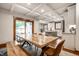Dining room with large windows, and a view of the backyard at 5677 Carrollton Ave, Indianapolis, IN 46220