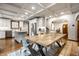 Dining room featuring coffered ceilings and an open layout to kitchen at 5677 Carrollton Ave, Indianapolis, IN 46220