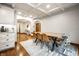 Dining room featuring coffered ceilings and view of the entryway at 5677 Carrollton Ave, Indianapolis, IN 46220