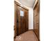 Inviting entryway with a craftsman door, unique tile flooring, and classic trim at 5677 Carrollton Ave, Indianapolis, IN 46220