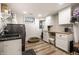 Functional laundry room with modern appliances, ample counter space, and well-organized storage, making laundry tasks efficient and convenient at 5677 Carrollton Ave, Indianapolis, IN 46220