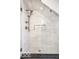 Contemporary shower featuring white marble tiles and elegant fixtures for a relaxing experience at 5677 Carrollton Ave, Indianapolis, IN 46220
