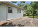Spacious back deck with white siding, perfect for outdoor entertaining at 6125 Winthrop Ave, Indianapolis, IN 46220