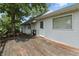 Spacious back deck with white siding, perfect for outdoor entertaining at 6125 Winthrop Ave, Indianapolis, IN 46220