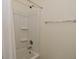 Bathroom bathtub with a shower head and white shower curtains at 680 Albermarle Dr, Pittsboro, IN 46167