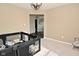 Neutral carpeted room featuring a bright window, whimsical decor and playroom set at 680 Albermarle Dr, Pittsboro, IN 46167