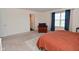 Open, airy bedroom with comfortable seating and ample natural light at 680 Albermarle Dr, Pittsboro, IN 46167