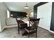 Cozy dining space connects seamlessly with the living room, perfect for intimate gatherings at 680 Albermarle Dr, Pittsboro, IN 46167