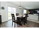 Inviting dining area with view to the living room, creating a seamless flow in this cozy home at 680 Albermarle Dr, Pittsboro, IN 46167