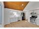 Modern kitchen featuring gray cabinets, stainless steel appliances, and an eat-in area at 716 Royal Troon Ct, Avon, IN 46123