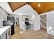 Well-appointed kitchen with stainless steel appliances, gray cabinets, and an eat-in area at 716 Royal Troon Ct, Avon, IN 46123