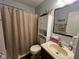 A full bathroom includes a toilet, sink and cabinet unit and walk-in shower at 7175 Oakview Dr, Avon, IN 46123