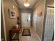 Inviting entryway featuring tile flooring, neutral walls, and a white front door at 7175 Oakview Dr, Avon, IN 46123