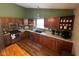 Functional kitchen with wood cabinets, stainless steel appliances, and ample counter space at 7175 Oakview Dr, Avon, IN 46123