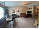 Cozy living room with carpet, ceiling fan, and plenty of space for seating at 7175 Oakview Dr, Avon, IN 46123