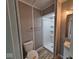 Clean bathroom showcasing a shower, toilet, sink and contemporary gray wall paint at 724 Iroquois St, Anderson, IN 46012