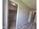 Bedroom featuring an adjacent walk-in closet and neutral wall paint at 724 Iroquois St, Anderson, IN 46012