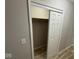 A well-sized closet with a sliding door offers great storage in this home with modern floors at 724 Iroquois St, Anderson, IN 46012