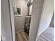 Utility closet featuring a new furnace, electrical panel, and durable flooring at 724 Iroquois St, Anderson, IN 46012