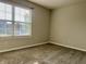 Bedroom with wall-to-wall carpet and window at 7532 Perilla Ct, Indianapolis, IN 46237