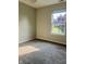 Bedroom with wall-to-wall carpet and window at 7532 Perilla Ct, Indianapolis, IN 46237