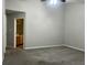 Spacious carpeted bedroom leading to bathroom at 7532 Perilla Ct, Indianapolis, IN 46237