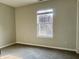 Bedroom featuring carpet and a window at 7532 Perilla Ct, Indianapolis, IN 46237