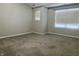 Cozy bedroom with neutral walls and plush carpeting at 7532 Perilla Ct, Indianapolis, IN 46237