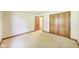 Bright and airy bedroom featuring neutral walls, plush carpeting, and a closet for organized storage at 7583 Rogers Dr, Indianapolis, IN 46214