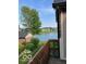 Enjoy a view of the pond and surrounding landscape from the back porch at 7707 River Rd # 10, Indianapolis, IN 46240