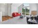 Open-concept living room with a large window and comfortable seating at 7766 Jamestown S S Dr, Fishers, IN 46038