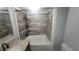 Bathroom featuring a tub with shower and modern vanity at 7879 Main St, Coatesville, IN 46121