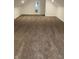 Spacious carpeted bedroom with gabled ceilings, bright natural light and views of the hallway at 802 N Oakland Ave, Indianapolis, IN 46201