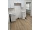 Clean kitchen design with white cabinets, bright countertops, and open layout at 802 N Oakland Ave, Indianapolis, IN 46201