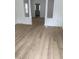 Living room with light wood floors and white trim at 802 N Oakland Ave, Indianapolis, IN 46201