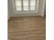 Bright living room with light wood flooring and built-in bench seating at 802 N Oakland Ave, Indianapolis, IN 46201