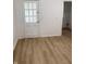 Room with light wood flooring and bright white walls at 802 N Oakland Ave, Indianapolis, IN 46201