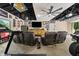Finished garage featuring a entertainment space with television, seating, and memorabilia at 8426 N Chickadee Dr, Morgantown, IN 46160