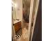 Compact bathroom features a vanity, a mirror, and a shower-tub combo, creating a functional space at 8457 Kousa Dr, Indianapolis, IN 46234