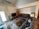 Comfortable living room featuring modern furnishings, a ceiling fan, and a sliding glass door at 8457 Kousa Dr, Indianapolis, IN 46234