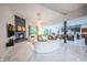 Bright and spacious living room with fireplace, modern furnishings, and open floor plan at 8703 Gordonshire Dr, Indianapolis, IN 46278