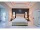 Serene main bedroom featuring a king-size bed, modern lighting, and neutral decor at 8703 Gordonshire Dr, Indianapolis, IN 46278